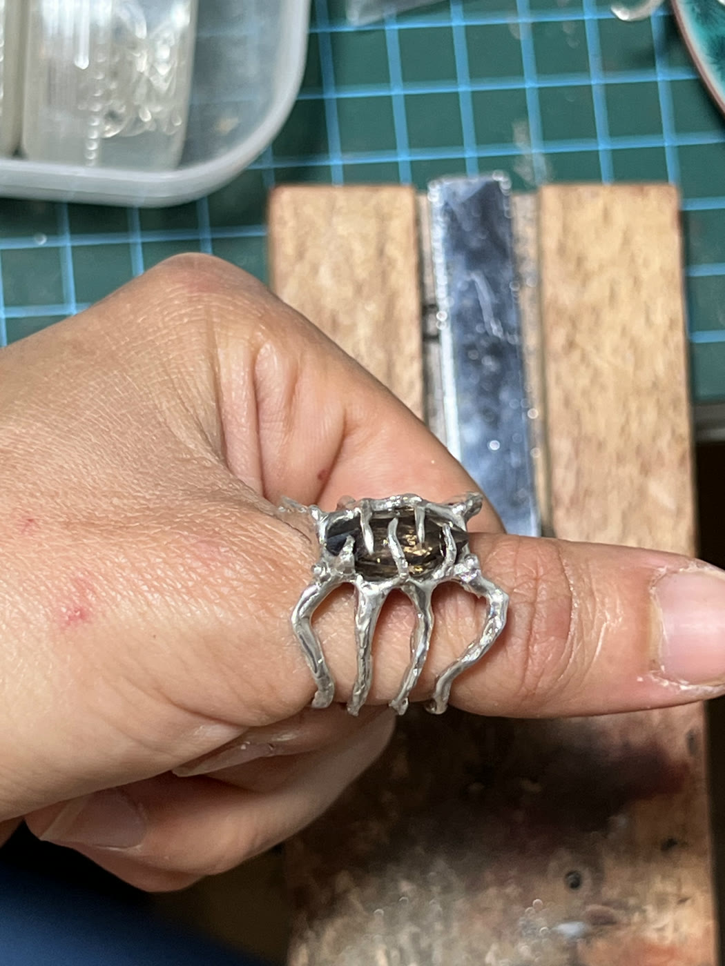 Commissioned silver ring, in the studio
